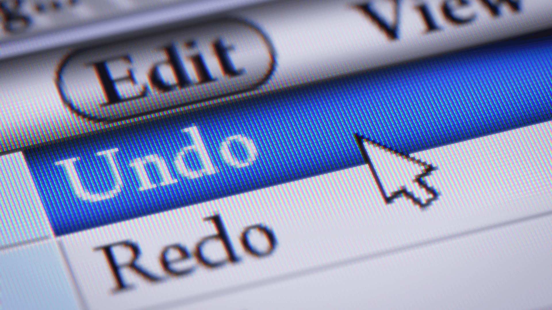 A mouse hovering over the Undo and Redo button on a computer, representing the undo and redo keyboard shortcut